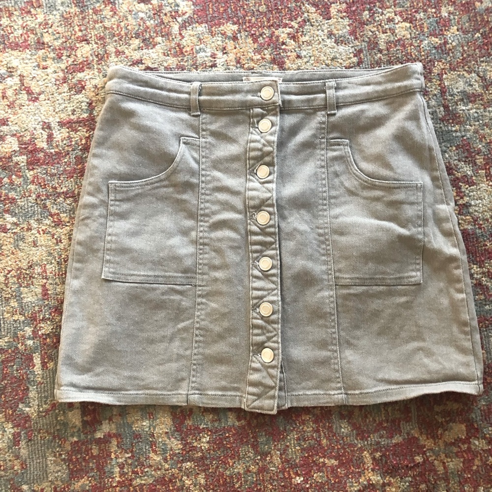 High waisted khaki colored button up jean skirt.
